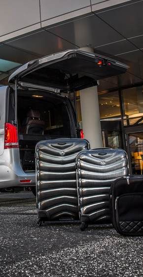 Open van boot loaded with luggage